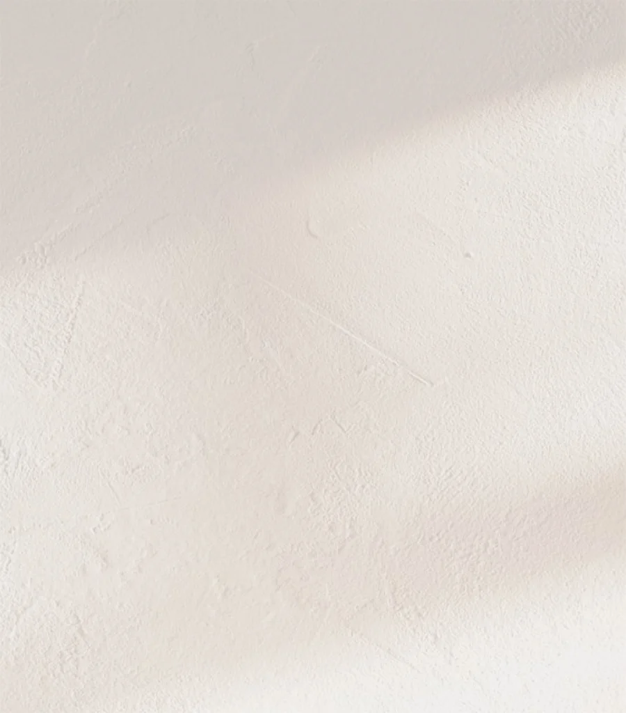 Subtle beige marble texture with soft veining and natural stone patterns for medical office background